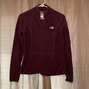 Purple north face pull over.